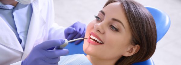 woman receiving a dental exam