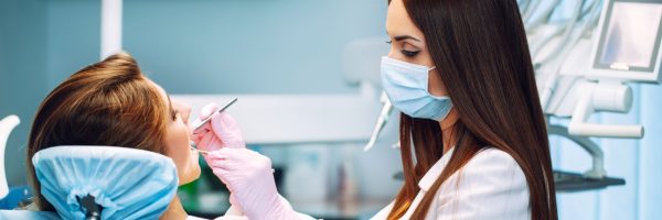 woman getting a dental cleaning