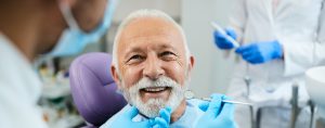 older man visiting the dentist